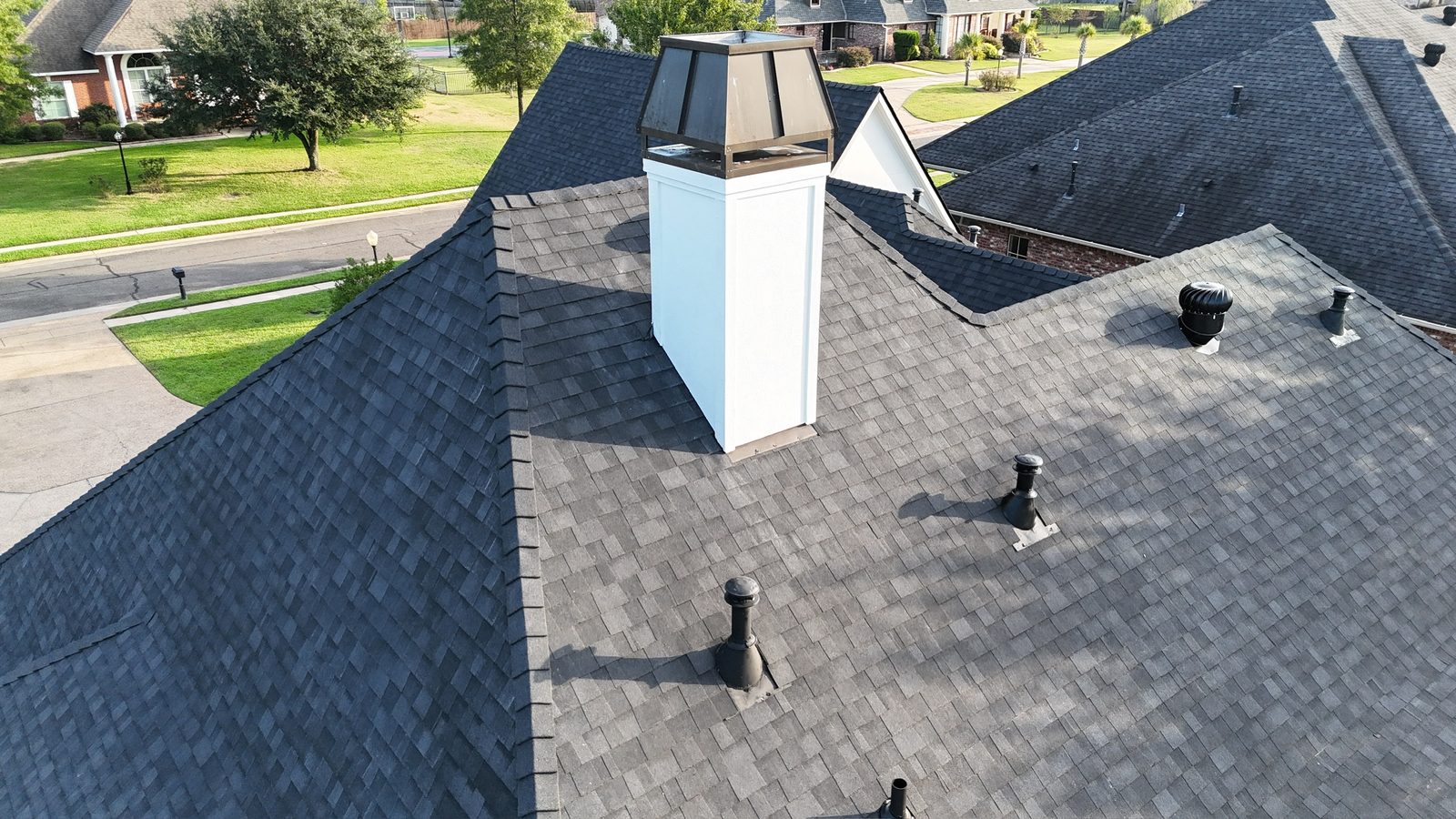 New shingle roof on an Acadian-style brick home in Shreveport-Bossier City