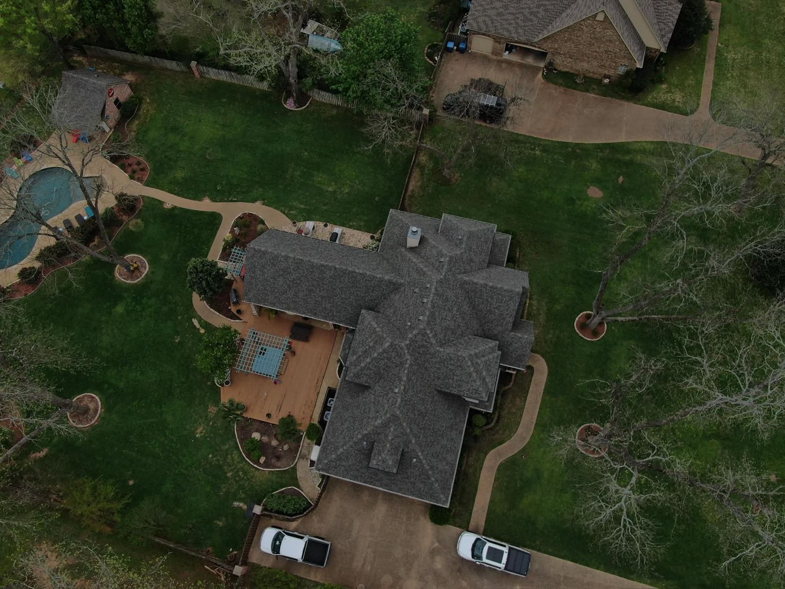 Aerial view of the same Shreveport home with its completed new shingle roof